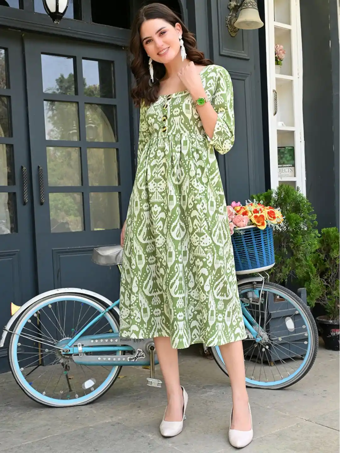 Meadow Green Motifs resemble handcrafted ethnic geometry Ethnic Printed Flared Midi Dress .png